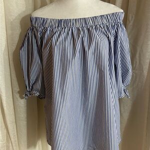Cha Cha Vente off the shoulder blue and white striped blouse.